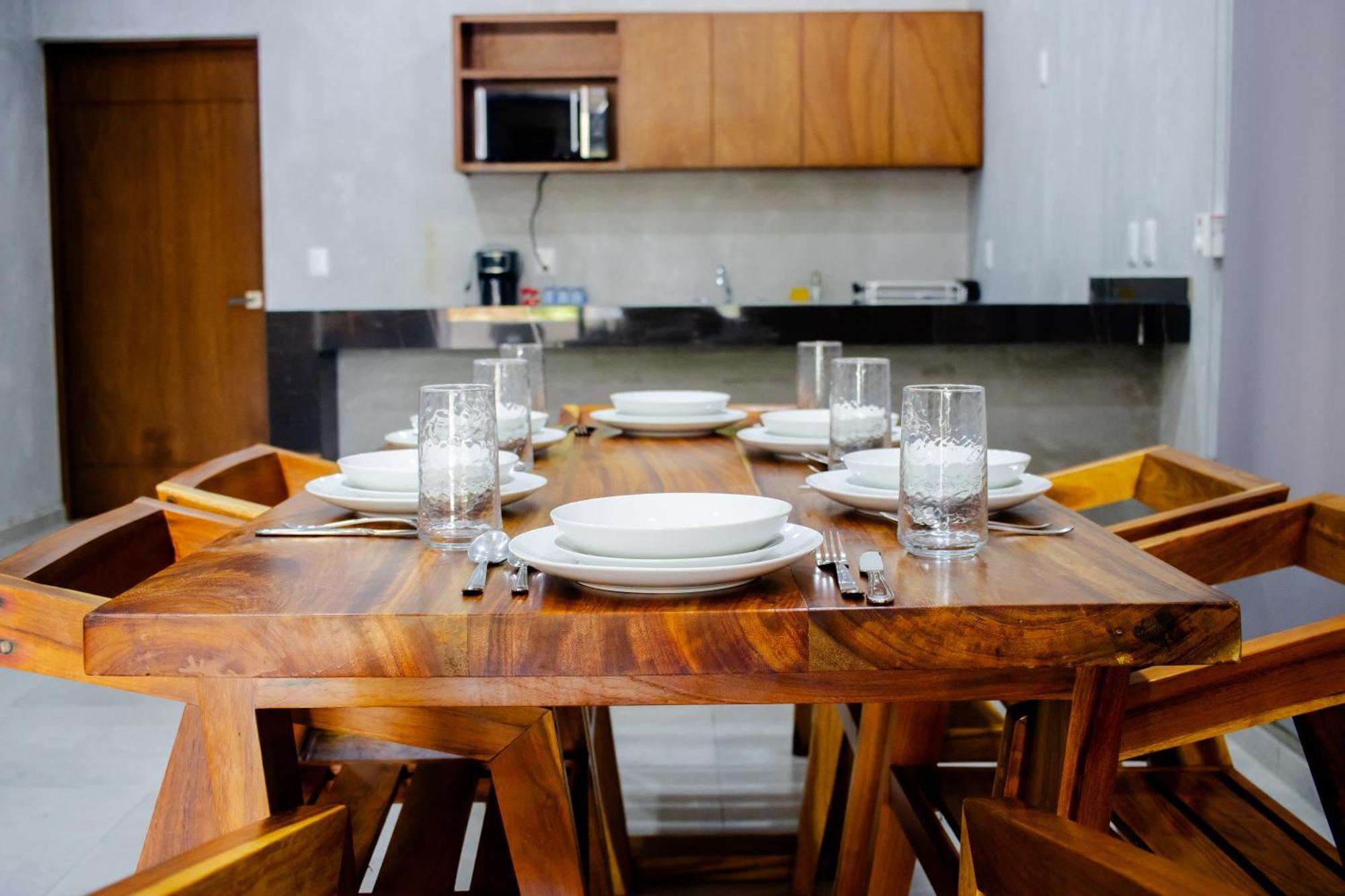 Hotel Casa Tortuga Tulum - Cenotes Park Inclusive Bagian luar foto A dining room table with place settings