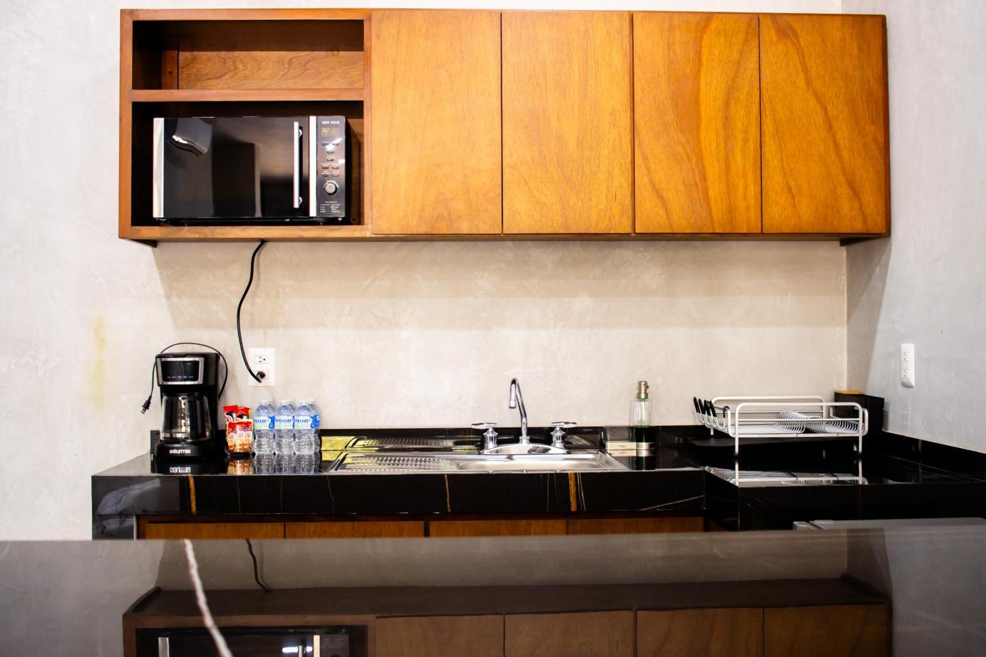 Hotel Casa Tortuga Tulum - Cenotes Park Inclusive Bagian luar foto A typical kitchenette